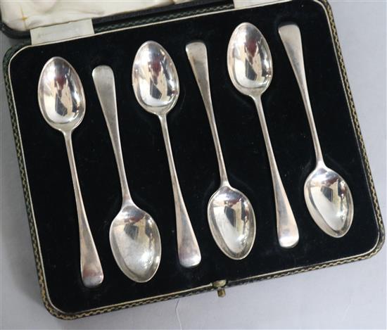 A cased set of six 1930s silver old English pattern coffee spoons.